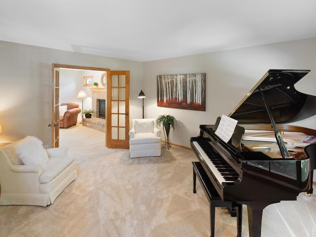 8118 Currant Pl, Eden Prairie, MN 55347 - sitting room featuring french doors, carpet, and a brick fireplace