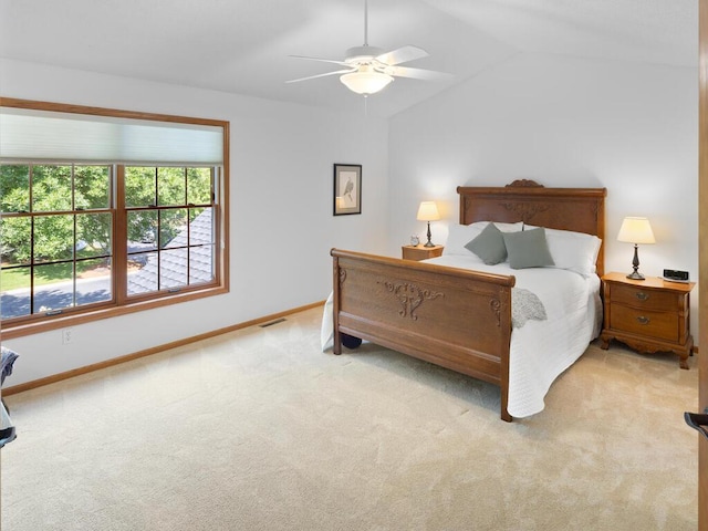 8118 Currant Pl, Eden Prairie, MN 55347 - bedroom featuring light colored carpet, lofted ceiling, and ceiling fan