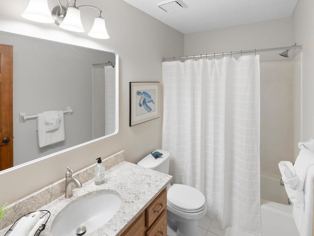 8118 Currant Pl, Eden Prairie, MN 55347 - bathroom featuring vanity, shower / bath combo with shower curtain, and tile patterned floors