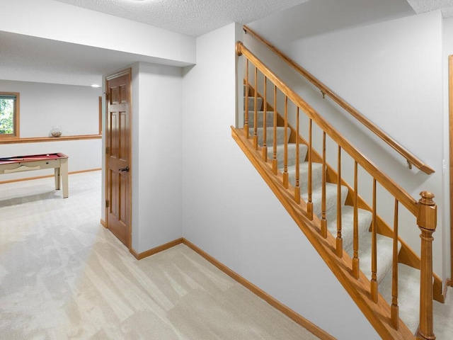 8118 Currant Pl, Eden Prairie, MN 55347 - stairway with carpet, a textured ceiling, and pool table