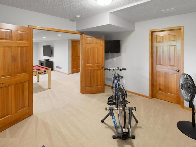 8118 Currant Pl, Eden Prairie, MN 55347 - exercise room with light colored carpet, a textured ceiling, and recessed lighting