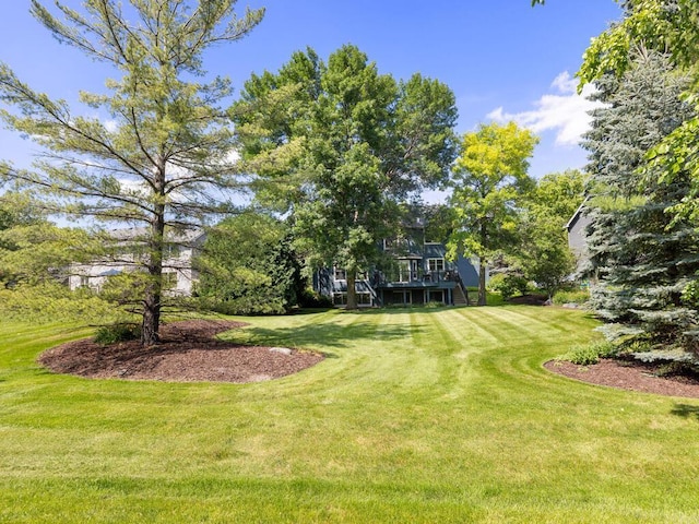 8118 Currant Pl, Eden Prairie, MN 55347 - view of grassy yard with a wooden deck