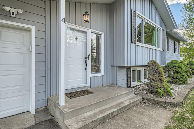 4 Battle Creek Ct, Saint Paul, MN 55119 - view of exterior entry featuring board and batten siding