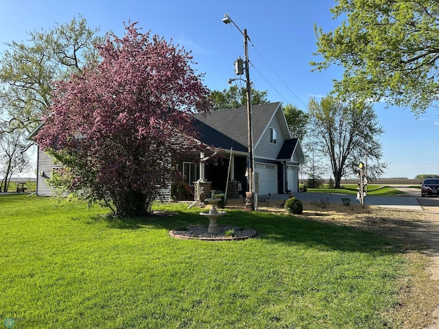 obstructed view of property featuring a front lawn