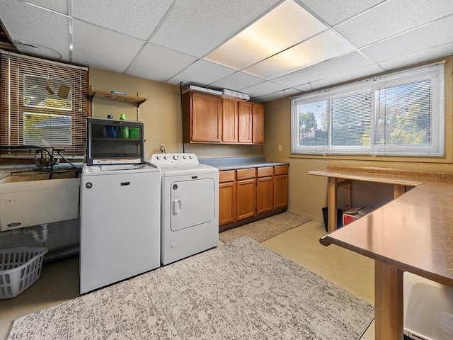 15029 Tyacke Dr, Burnsville, MN 55306 - laundry room with a sink, cabinet space, and washer and dryer