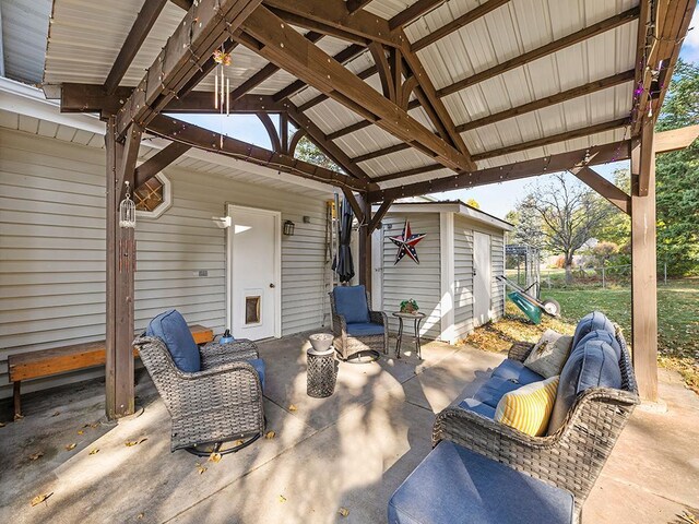 15029 Tyacke Dr, Burnsville, MN 55306 - view of patio / terrace with fence, a storage shed, a gazebo, an outdoor living space, and an outdoor structure