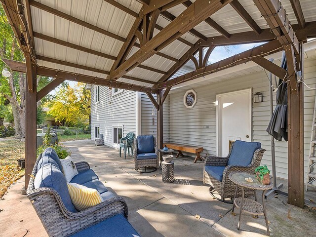 15029 Tyacke Dr, Burnsville, MN 55306 - view of patio / terrace featuring an outdoor living space and a gazebo