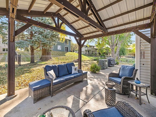 15029 Tyacke Dr, Burnsville, MN 55306 - view of patio / terrace with an outdoor hangout area and fence