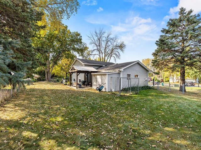 15029 Tyacke Dr, Burnsville, MN 55306 - view of yard featuring a gazebo and fence