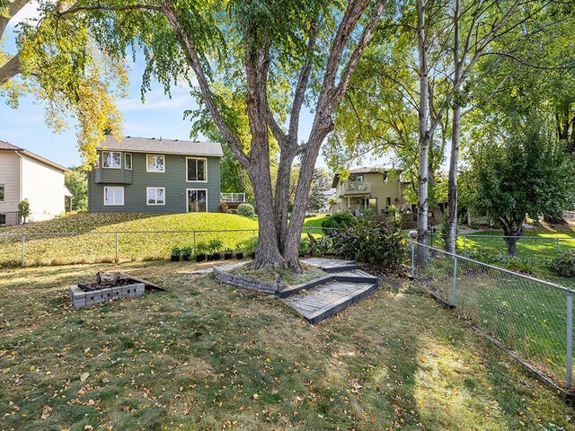 15029 Tyacke Dr, Burnsville, MN 55306 - view of yard featuring a fenced backyard