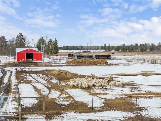 17430 280th St, Sebeka, MN 56477 - yard layered in snow with a pole building and an outdoor structure
