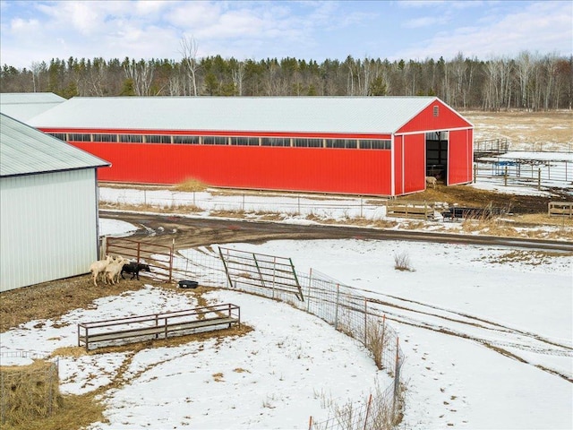 17430 280th St, Sebeka, MN 56477 - snowy yard featuring an outbuilding and an outdoor structure