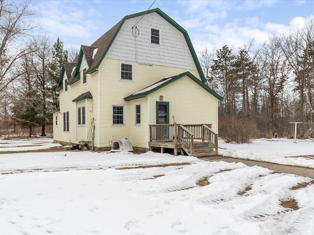 17430 280th St, Sebeka, MN 56477 - snow covered rear of property featuring a gambrel roof and roof with shingles