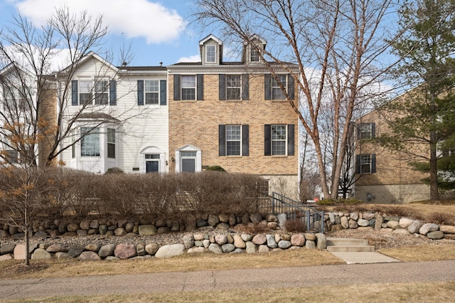 15767 Porchlight Ln, Eden Prairie, MN 55347 - view of front of home featuring brick siding