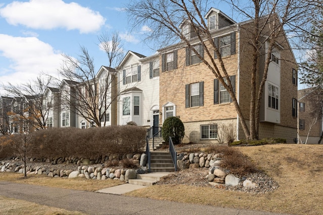 15767 Porchlight Ln, Eden Prairie, MN 55347 - view of front facade with brick siding