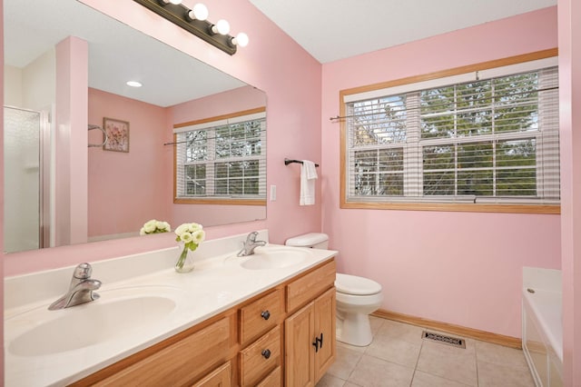 15767 Porchlight Ln, Eden Prairie, MN 55347 - full bathroom featuring visible vents, toilet, tile patterned flooring, and a sink