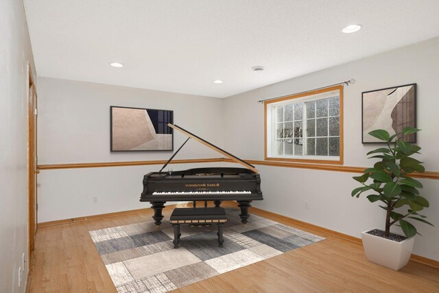 15767 Porchlight Ln, Eden Prairie, MN 55347 - living area featuring baseboards, wood finished floors, and recessed lighting