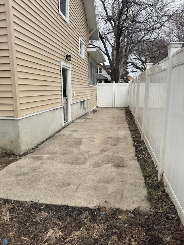 exterior space featuring a fenced backyard