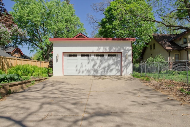 detached garage with fence