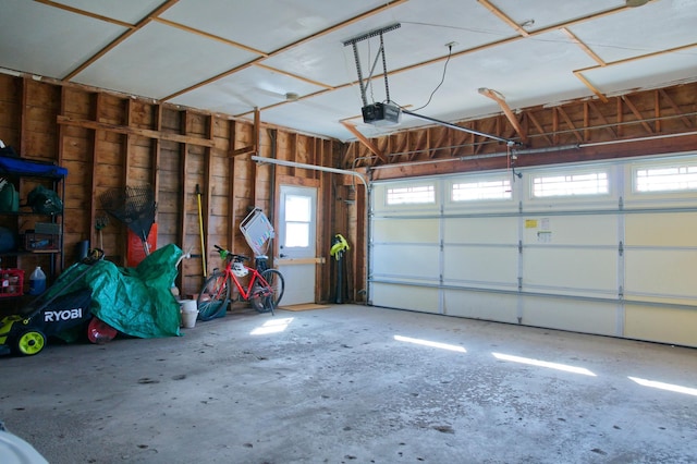 garage featuring a garage door opener