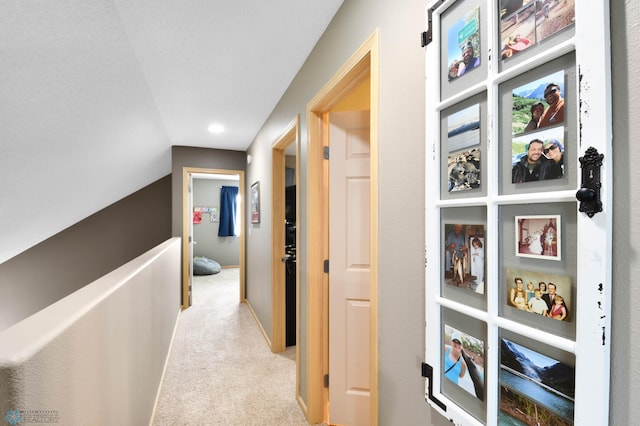 corridor with light colored carpet