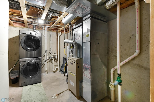 unfinished basement with stacked washer and dryer