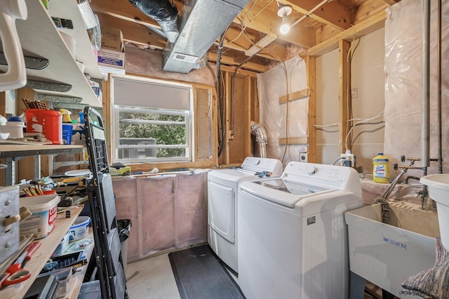 laundry room with washing machine and dryer