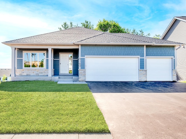 9160 62nd St S, Cottage Grove, MN 55016 - ranch-style house with stone siding, driveway, a garage, a front lawn, and a shingled roof