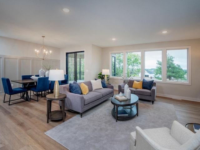 9160 62nd St S, Cottage Grove, MN 55016 - living area with a chandelier, light wood-style flooring, and recessed lighting
