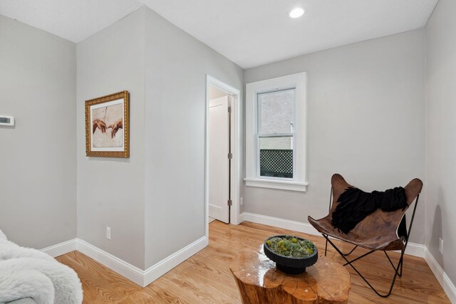 4015 Queen Ave N, Minneapolis, MN 55412 - sitting room with light wood finished floors and baseboards