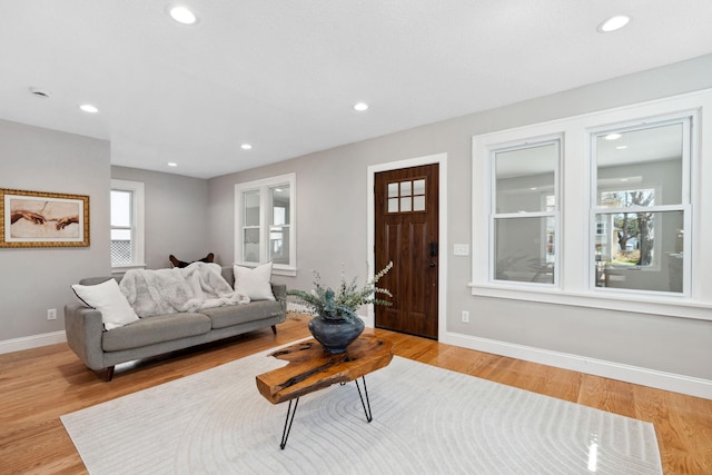 4015 Queen Ave N, Minneapolis, MN 55412 - living area featuring baseboards, light wood-type flooring, and recessed lighting