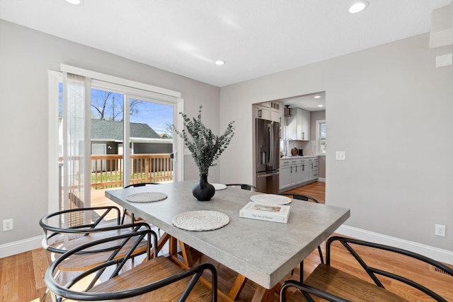 4015 Queen Ave N, Minneapolis, MN 55412 - dining space with light wood-style floors, baseboards, and recessed lighting
