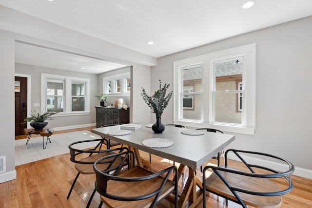4015 Queen Ave N, Minneapolis, MN 55412 - dining room with light wood-style floors, visible vents, baseboards, and recessed lighting