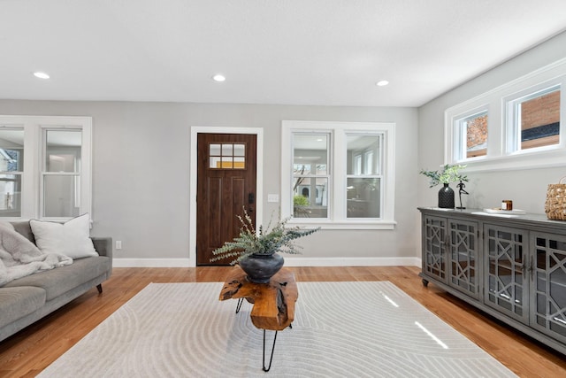 4015 Queen Ave N, Minneapolis, MN 55412 - living area featuring wood finished floors, baseboards, and recessed lighting