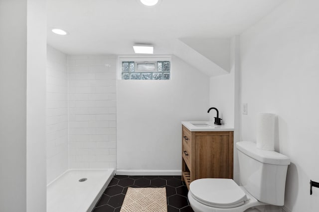 4015 Queen Ave N, Minneapolis, MN 55412 - bathroom with toilet, a tile shower, vanity, and tile patterned flooring