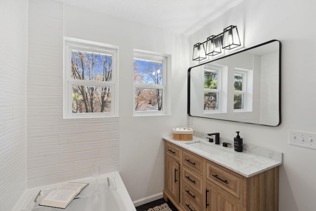 4015 Queen Ave N, Minneapolis, MN 55412 - bathroom featuring baseboards and vanity