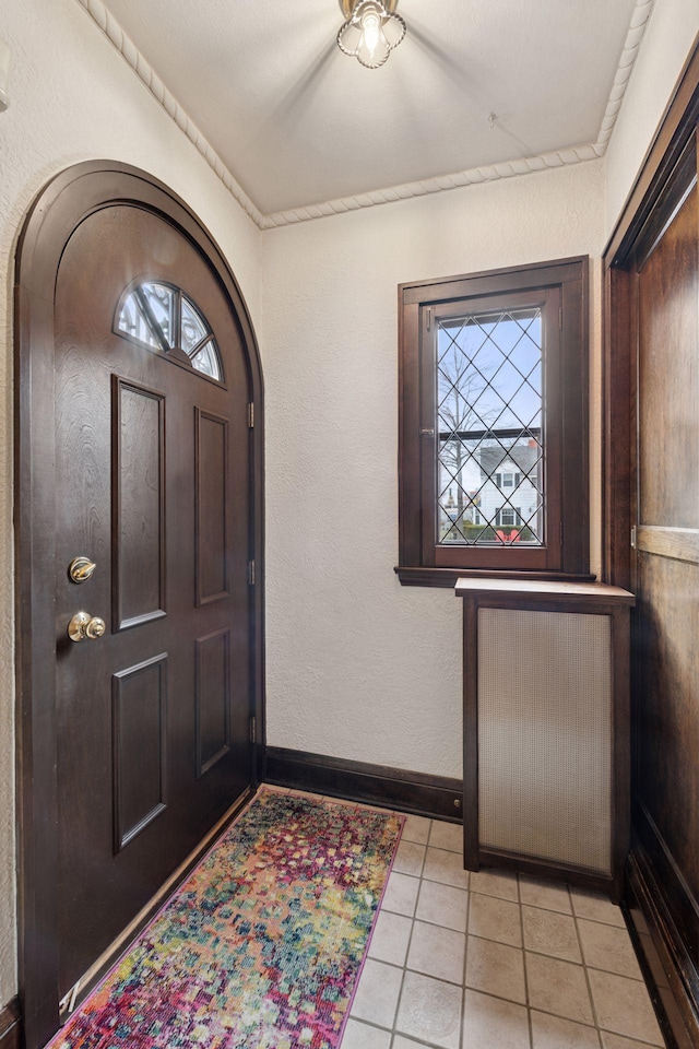 300 Diamond Lake Rd, Minneapolis, MN 55419 - foyer featuring light tile patterned floors and baseboards