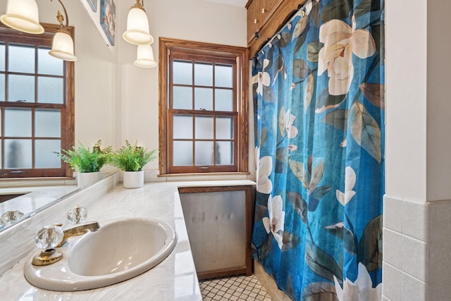 300 Diamond Lake Rd, Minneapolis, MN 55419 - bathroom with vanity, a shower with shower curtain, tile patterned flooring, and plenty of natural light