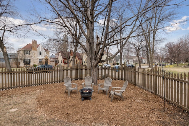 300 Diamond Lake Rd, Minneapolis, MN 55419 - view of yard featuring a residential view, a fire pit, and fence private yard