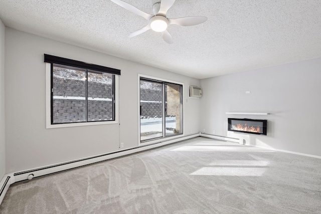 unfurnished living room with carpet, a textured ceiling, and a wall unit AC
