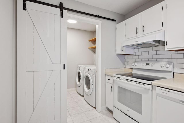 kitchen with a barn door, light countertops, white appliances, under cabinet range hood, and independent washer and dryer