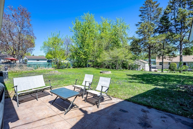 view of patio with an outdoor fire pit