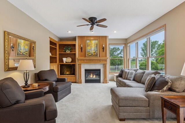 268 Saint Andrews Dr, Hudson, WI 54016 - carpeted living area with a ceiling fan, a fireplace, and recessed lighting