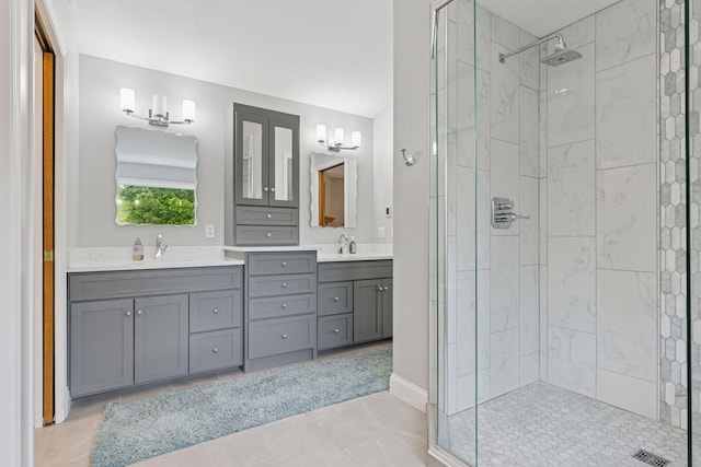 268 Saint Andrews Dr, Hudson, WI 54016 - bathroom with a shower stall, double vanity, and baseboards