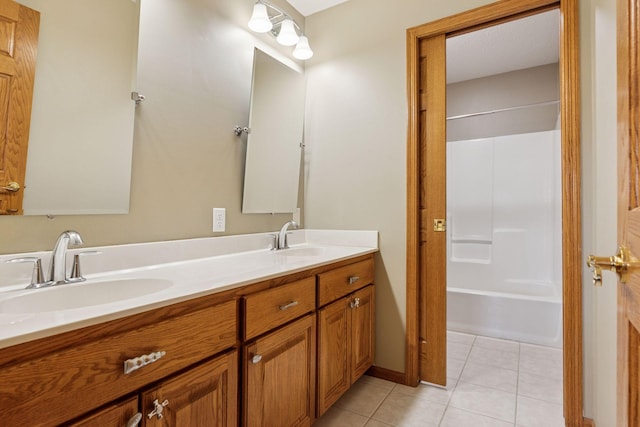 268 Saint Andrews Dr, Hudson, WI 54016 - full bathroom with double vanity, tile patterned floors, and shower / tub combination