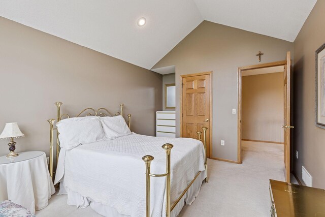 268 Saint Andrews Dr, Hudson, WI 54016 - bedroom with light colored carpet, baseboards, and high vaulted ceiling
