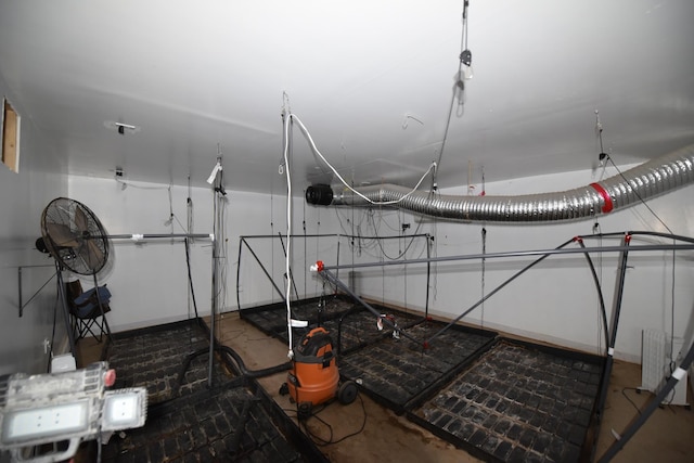 18625 Skunk Lake Rd, Dell Grove Twp, MN 55072 - misc room featuring baseboards and concrete flooring