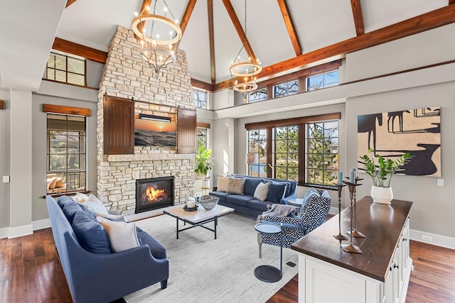 425 Carpenters Pt, Wayzata, MN 55391 - living area with high vaulted ceiling, baseboards, a fireplace, beam ceiling, and dark wood-style floors