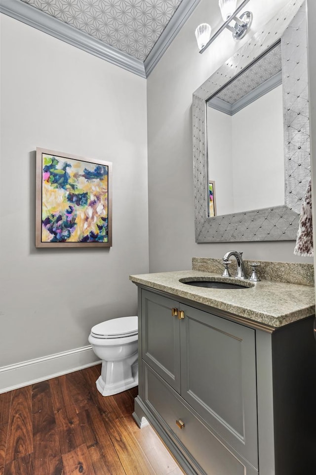 425 Carpenters Pt, Wayzata, MN 55391 - half bath featuring baseboards, wood finished floors, an ornate ceiling, vanity, and toilet