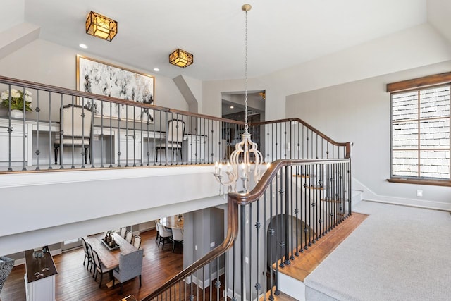 425 Carpenters Pt, Wayzata, MN 55391 - stairway with a chandelier, a high ceiling, baseboards, and recessed lighting